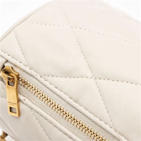 SADE MINI TUBE BAG IN QUILTED LAMBSKIN.